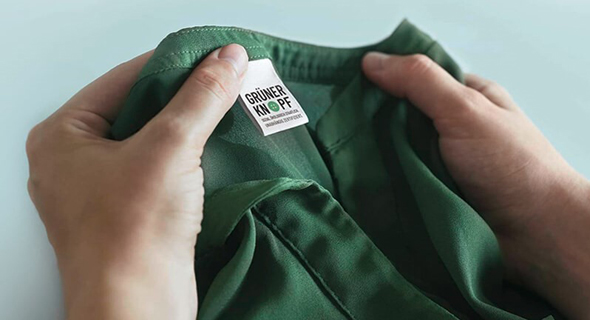 RAL wird Vergabestelle für das Textilsiegel „Grüner Knopf”